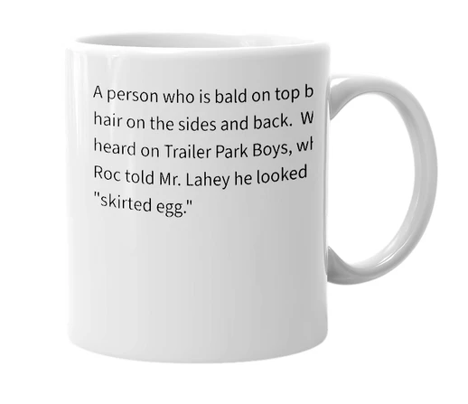 White mug with the definition of 'skirted egg'