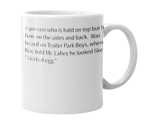 White mug with the definition of 'skirted egg'