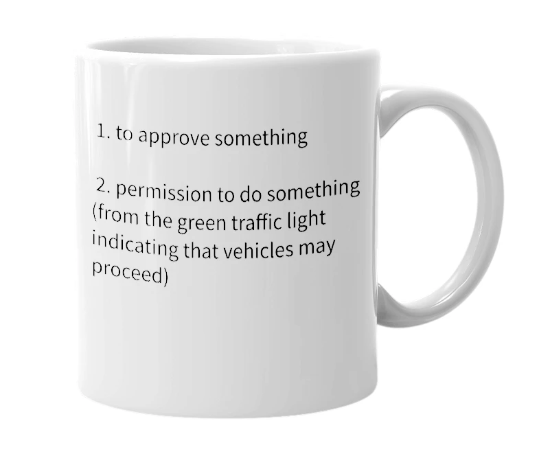 White mug with the definition of 'green-light'