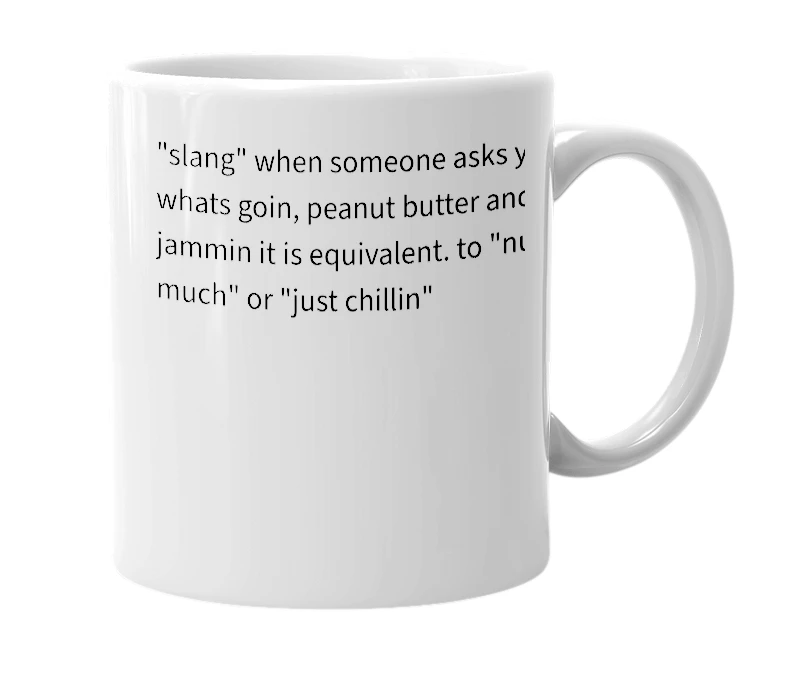 White mug with the definition of 'Peanut Butter and jammin it.'