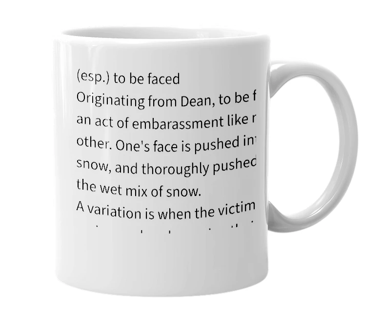 White mug with the definition of 'faced'