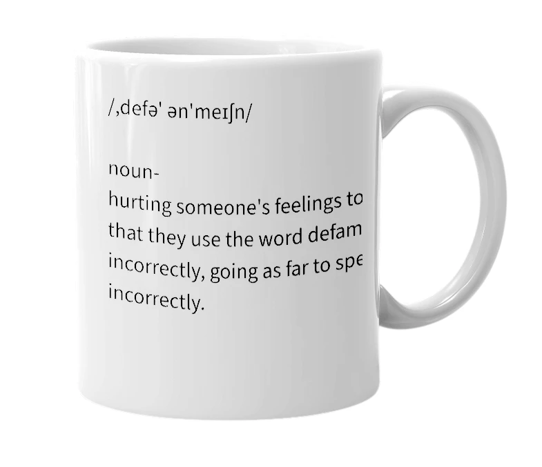 White mug with the definition of 'Defamination'