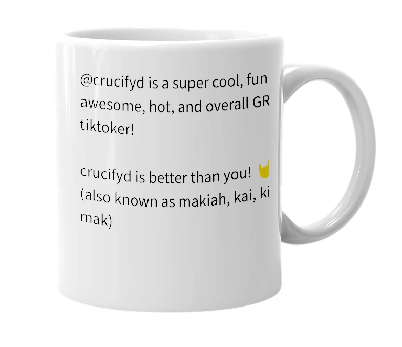 White mug with the definition of 'crucifyd'