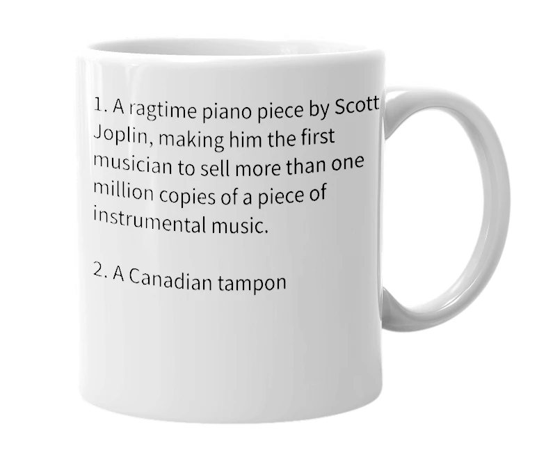 White mug with the definition of 'Maple Leaf Rag'