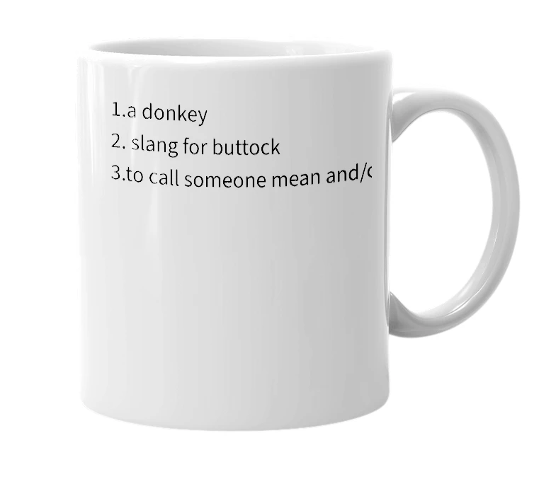 White mug with the definition of 'ass'