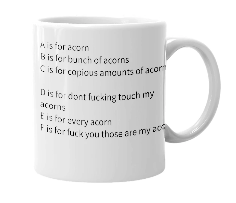 White mug with the definition of 'Acorn'