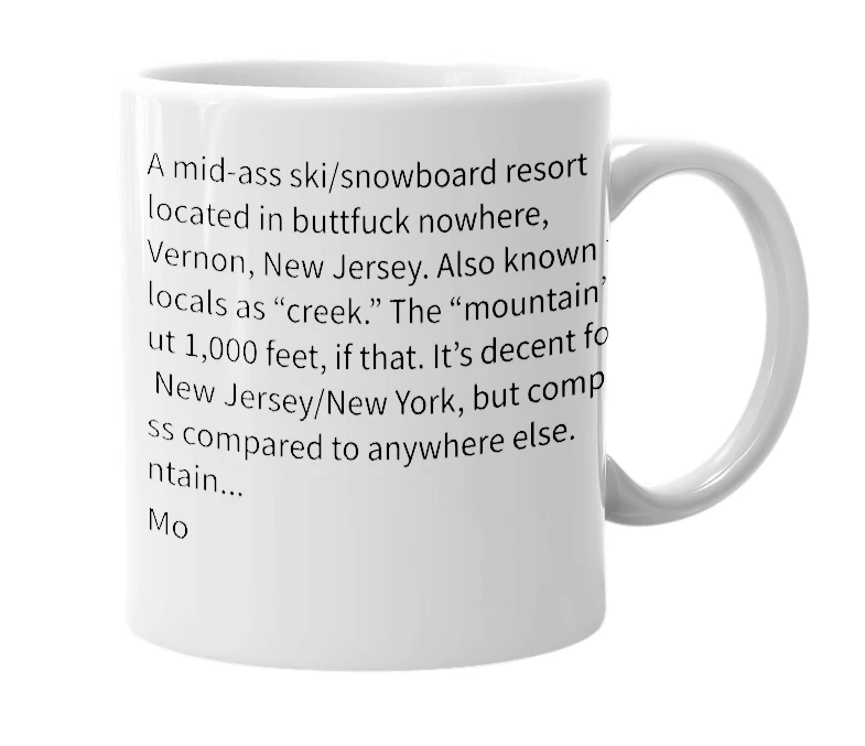 White mug with the definition of 'mountain creek'