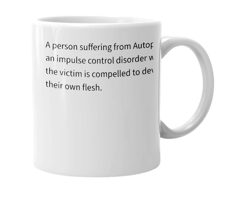 White mug with the definition of 'Autophagiac'