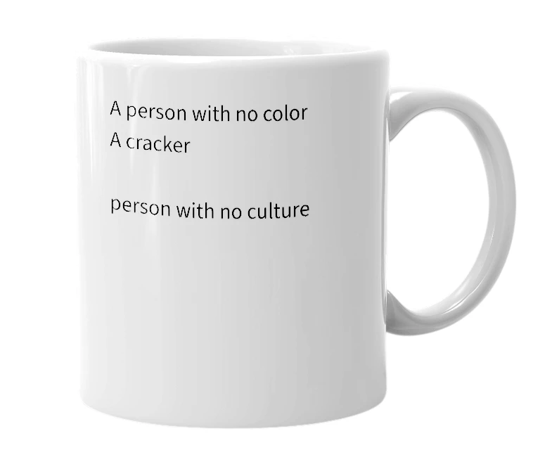White mug with the definition of 'wh*te'