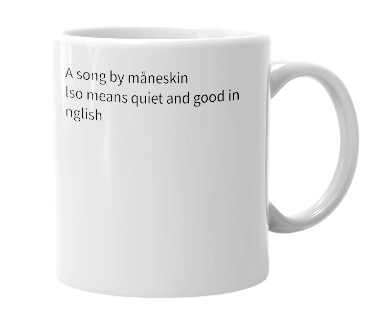 White mug with the definition of 'zitti e buoni'