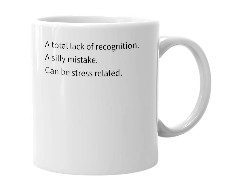 White mug with the definition of 'brain-fart'