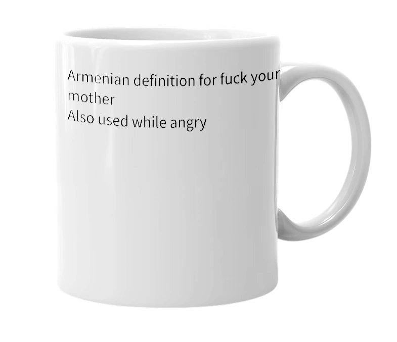 White mug with the definition of 'mert qunem'