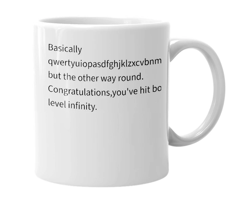 White mug with the definition of 'mnbvcxzasdfghjklpoiuytrewqqwertyuiopljhgfdsazxcvbnm'