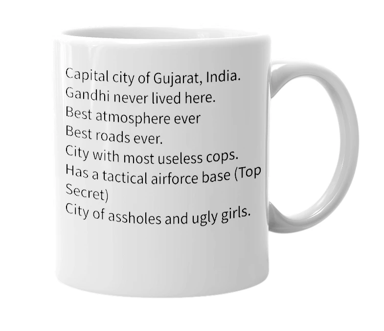White mug with the definition of 'Gandhinagar'