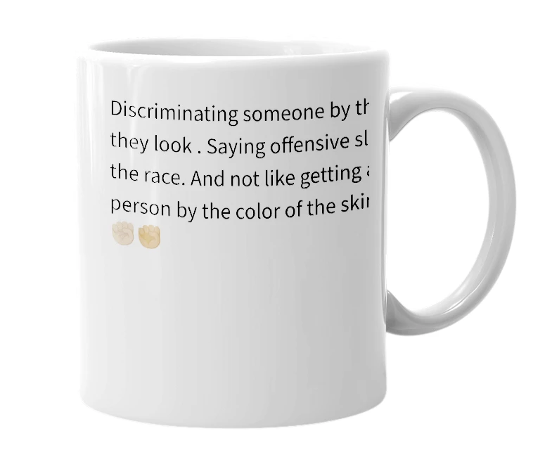 White mug with the definition of 'racist'