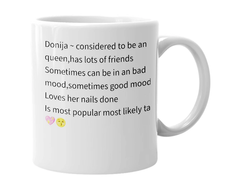 White mug with the definition of 'donija'