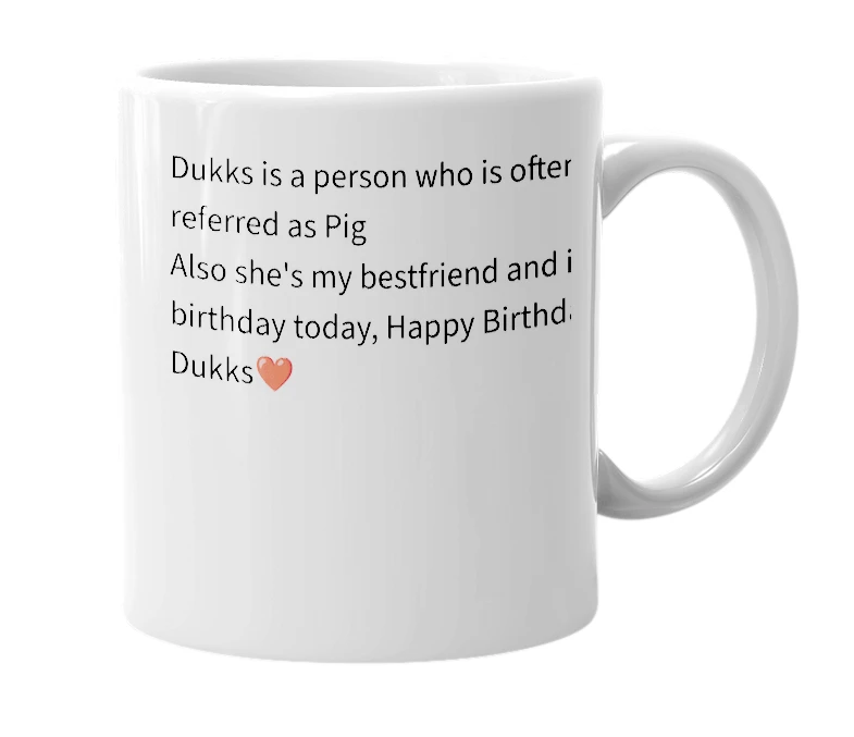 White mug with the definition of 'Dukks'