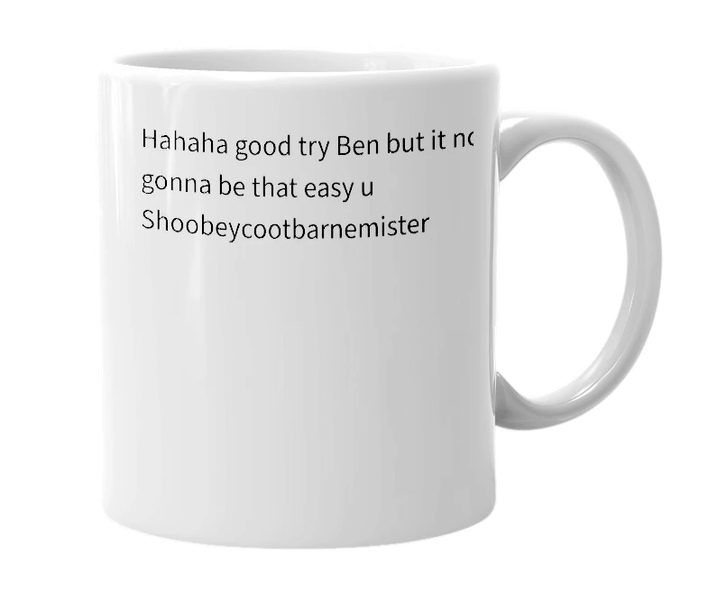 White mug with the definition of 'shoobeycootbarnmeister'