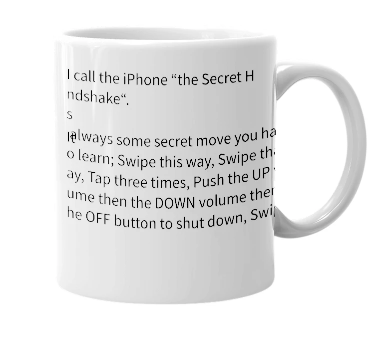 White mug with the definition of 'iPhone Secret Handshake'