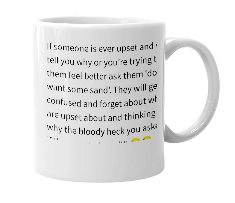 White mug with the definition of 'Sand'
