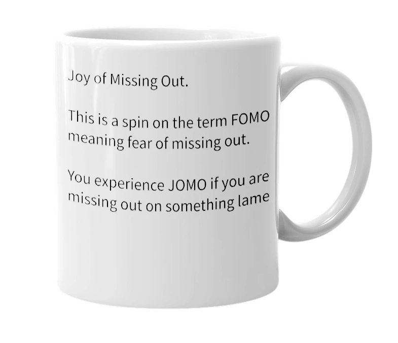 White mug with the definition of 'JOMO'