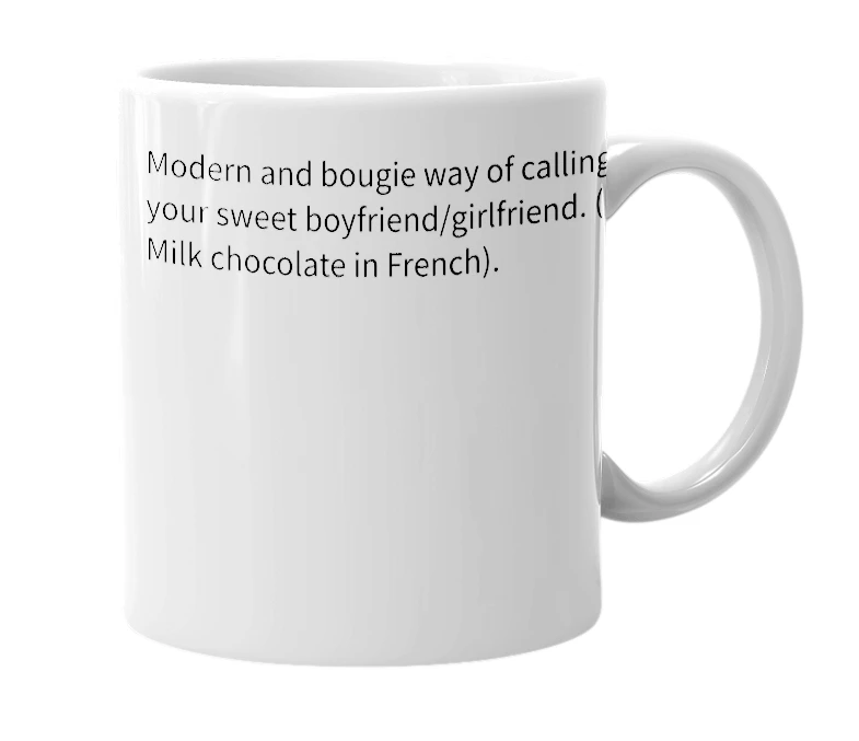 White mug with the definition of 'chocolat au lait'