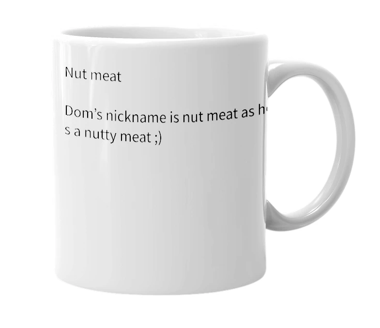 White mug with the definition of 'Nut meat'