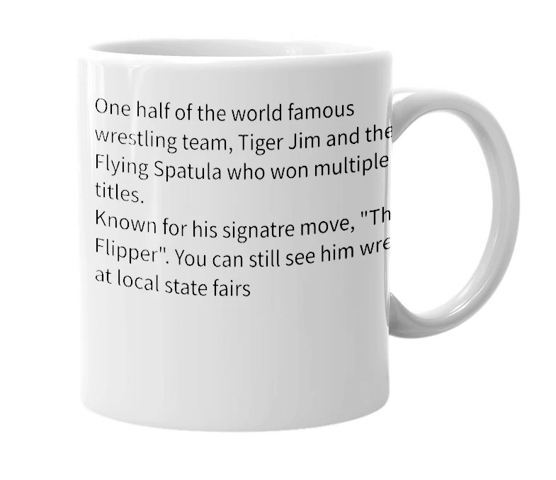 White mug with the definition of 'Flying Spatula'