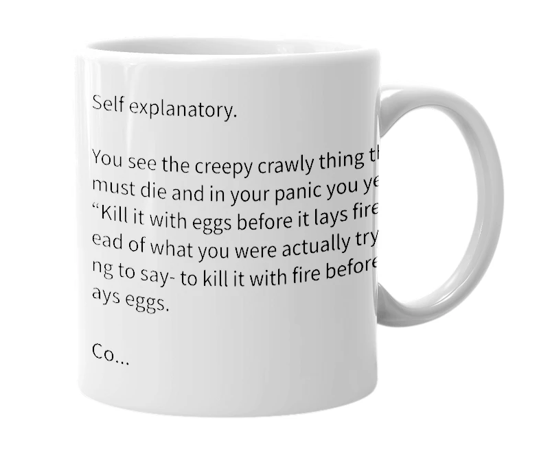 White mug with the definition of 'Kill it with eggs before it lays fire!'