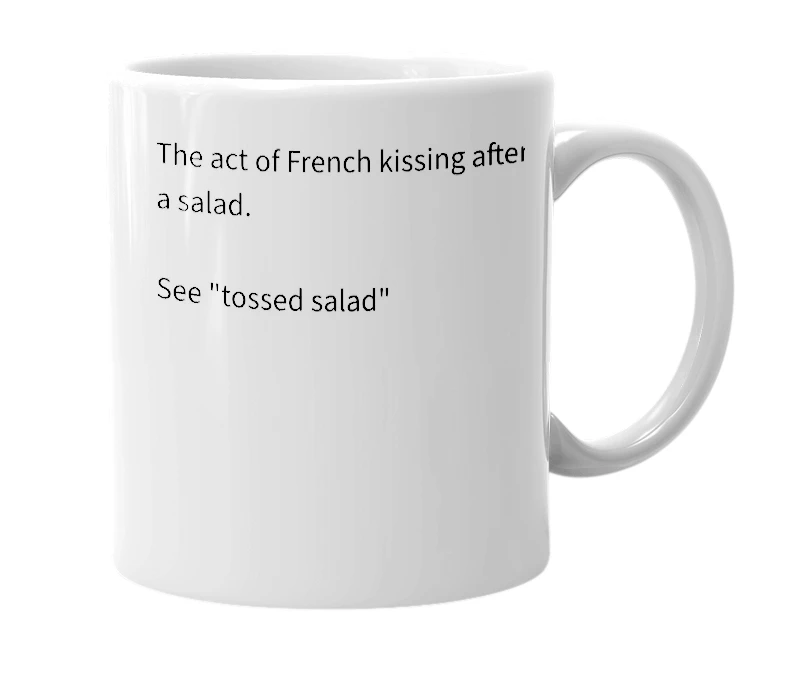 White mug with the definition of 'Quebecer kiss'