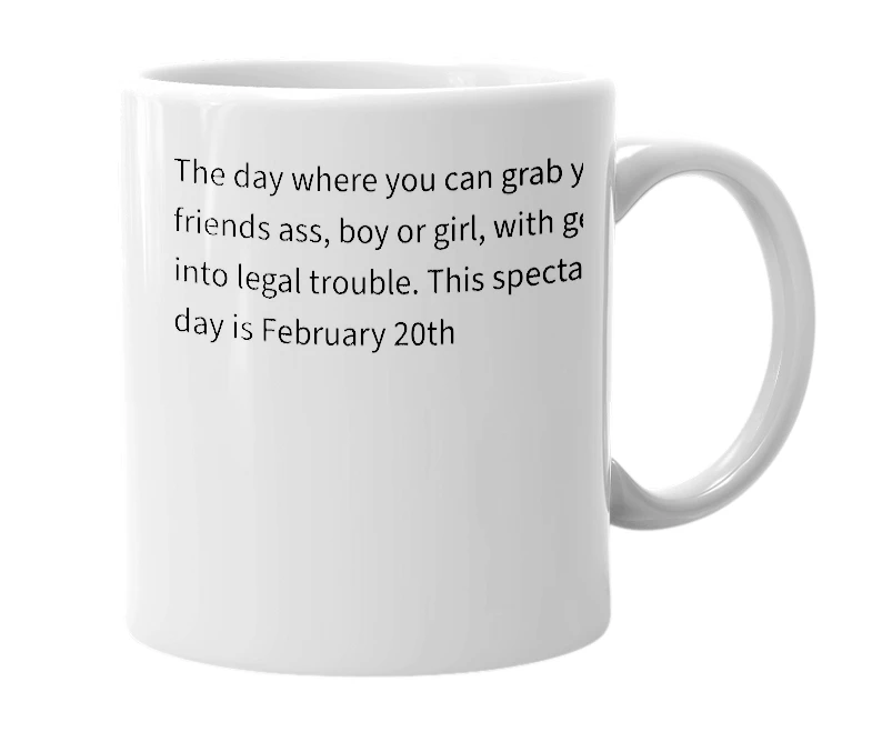 White mug with the definition of 'National Grab an Ass day'