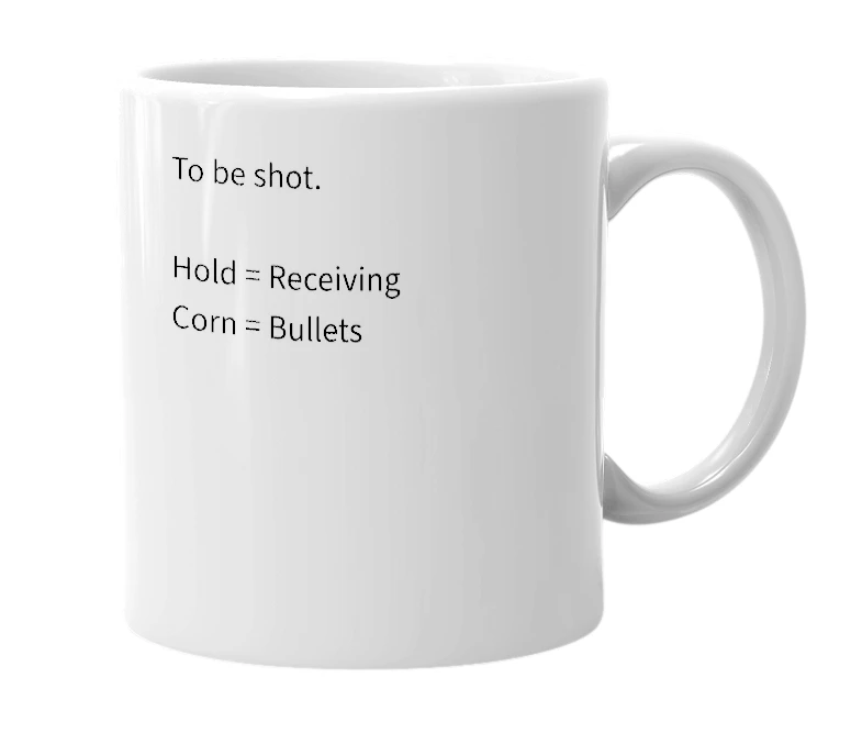 White mug with the definition of 'Hold Corn'