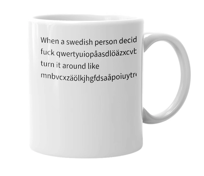 White mug with the definition of 'mnbvcxzäölkjhgfdsaåpoiuytrewq'