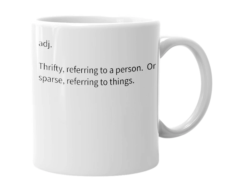 White mug with the definition of 'frugal'