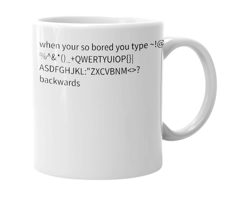 White mug with the definition of '?><mnbvcxz":lkjhgfdsa|}{poiuytrewq+_)(*&^%$#@!~'