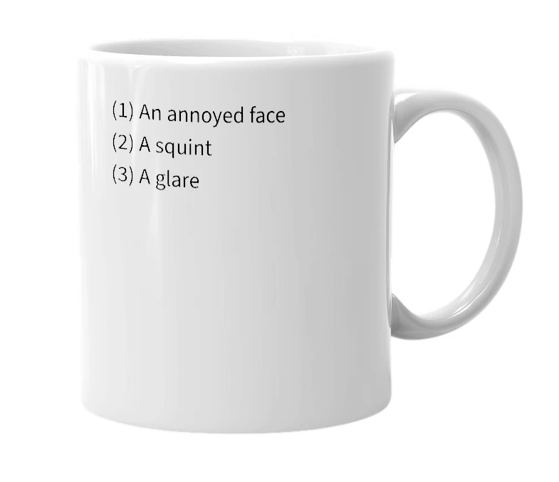 White mug with the definition of '--_--'