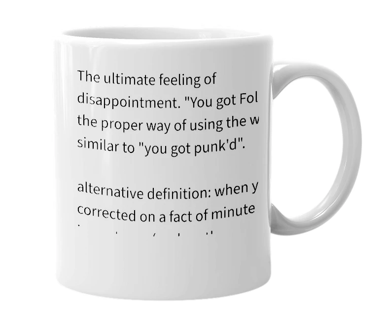 White mug with the definition of 'Folkered'