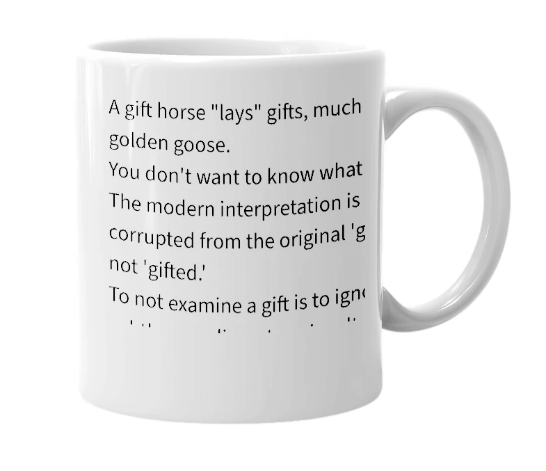 White mug with the definition of 'Look a gift horse in the mouth'