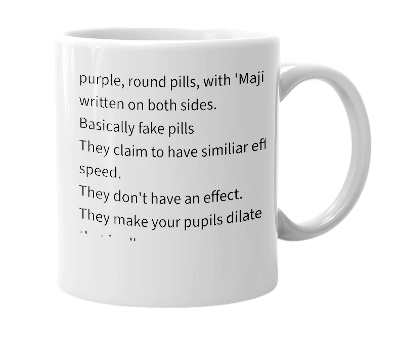White mug with the definition of 'Majik pills'