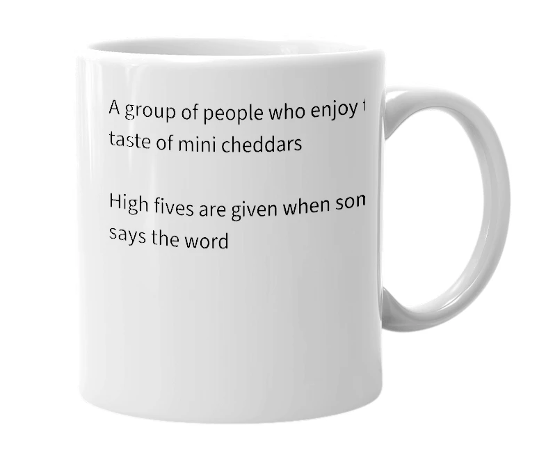 White mug with the definition of 'Minicheddarfamalamfan'