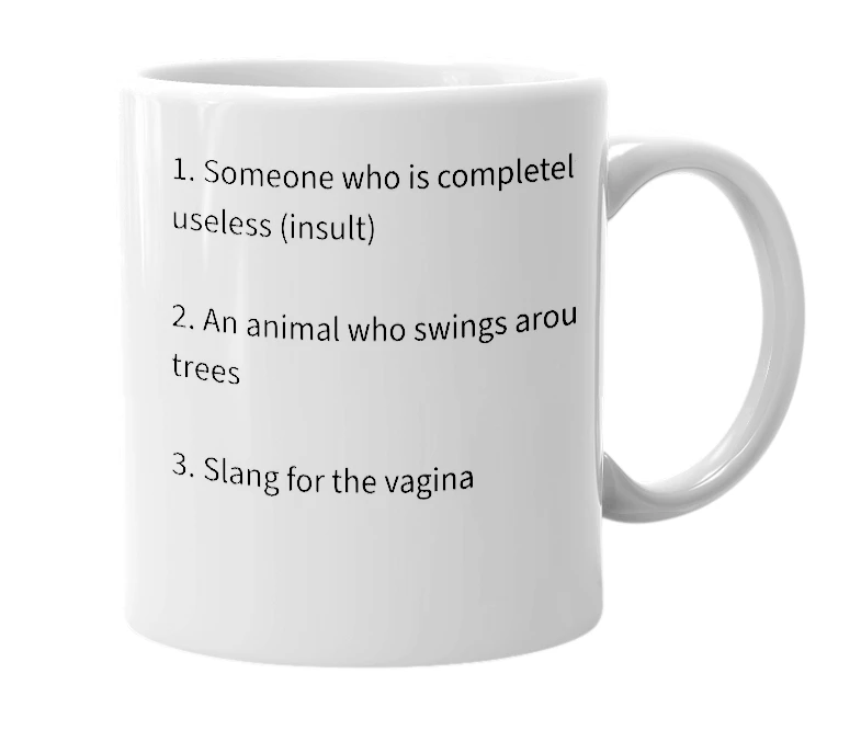 White mug with the definition of 'Monkey'