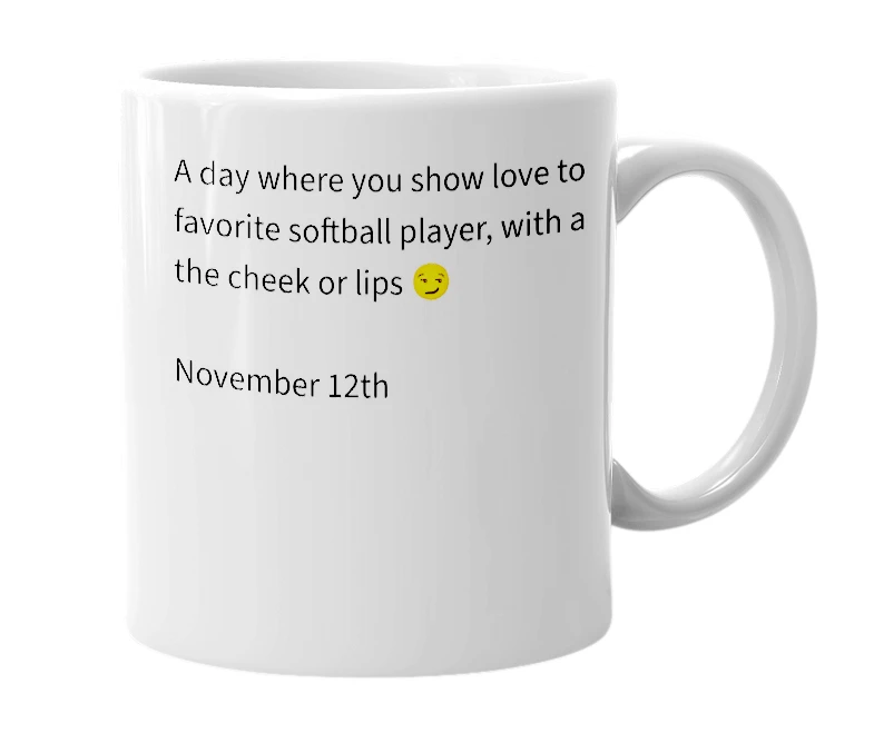White mug with the definition of 'National kiss a softball player day'