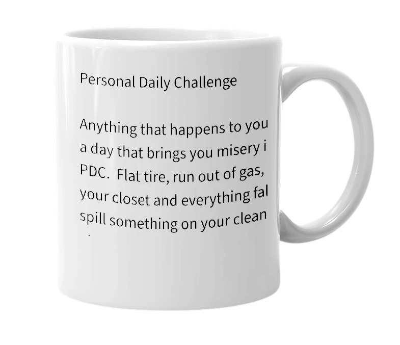 White mug with the definition of 'P.D.C.'