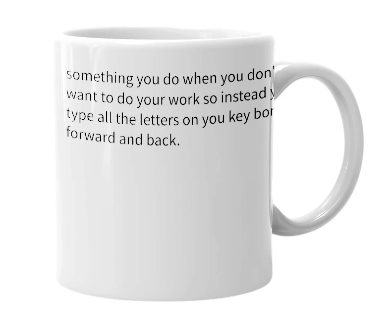 White mug with the definition of 'Qwertyuiopasdfghjklzxcvbnm mnbvcxzlkjhgfdsapoiuytrewq'