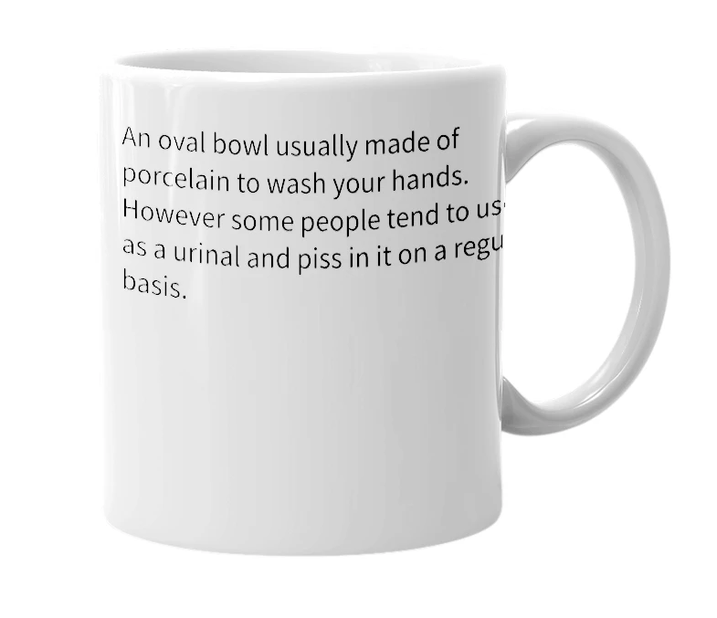 White mug with the definition of 'Sink'