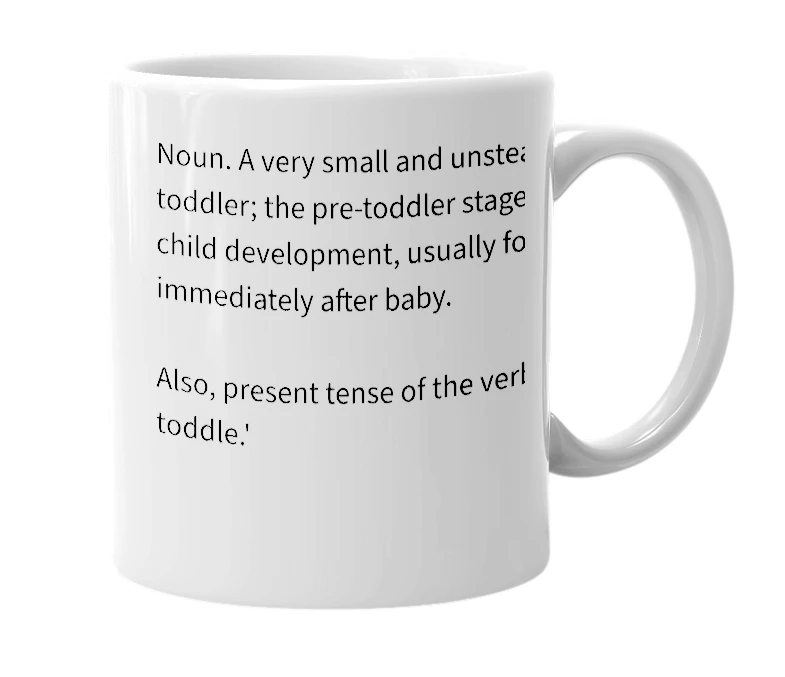 White mug with the definition of 'Toddling'