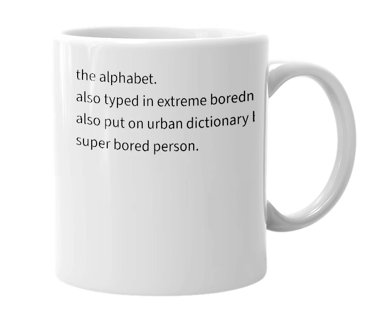 White mug with the definition of 'abcdefghijklmnopqrstuvwxyz'