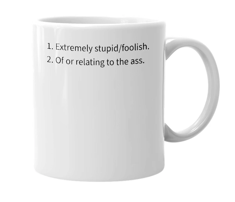 White mug with the definition of 'assinine'