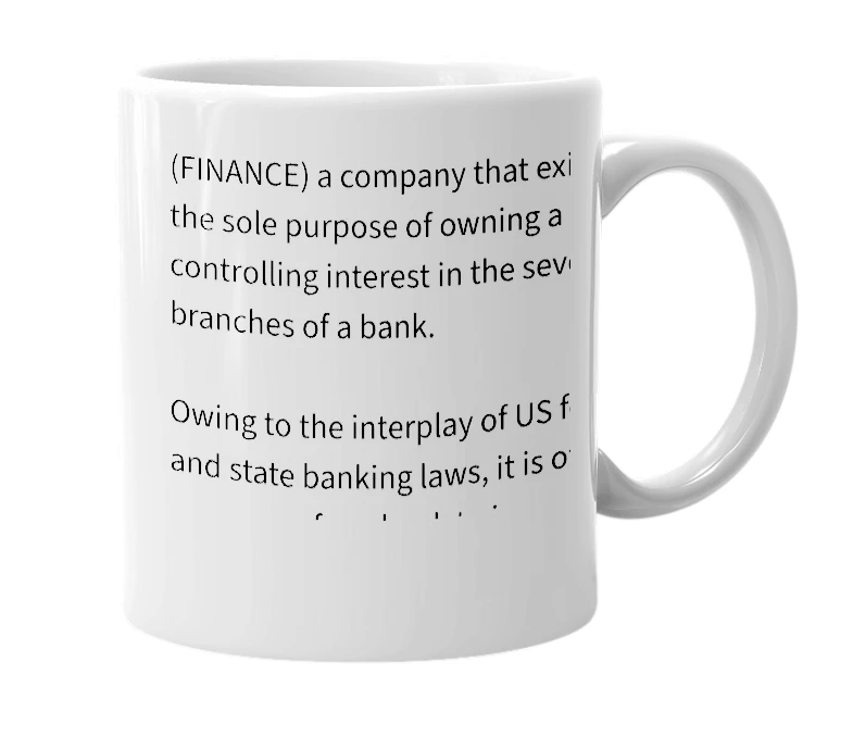 White mug with the definition of 'bank holding company'