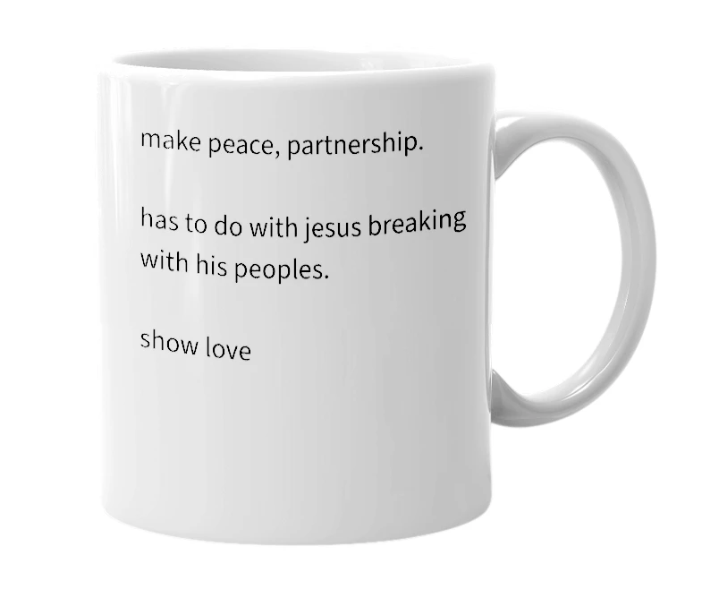 White mug with the definition of 'break bread'